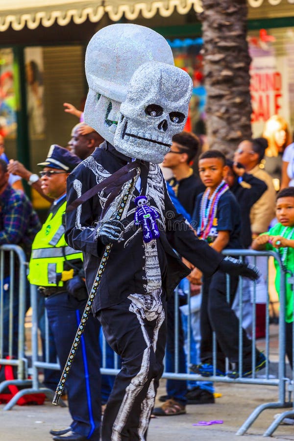 NEW ORLEANS USA FEB 1 2016: Mardi Gras parades through the streets of New Orleans.People celebrated crazily. Mardi Gras is the biggest celebration the city of New Orleans hosts every year. NEW ORLEANS USA FEB 1 2016: Mardi Gras parades through the streets of New Orleans.People celebrated crazily. Mardi Gras is the biggest celebration the city of New Orleans hosts every year.