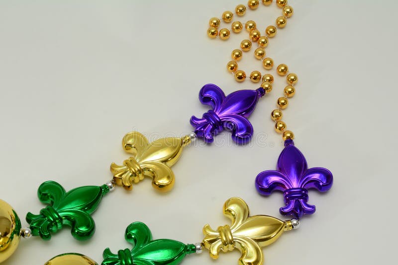 Mardi Gras Beads with Fleur De Lis Stock Image Image of gold, mardi