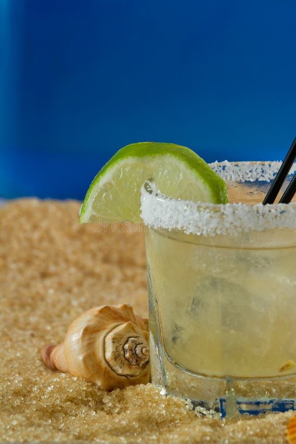 Margarita on the beach stock photo. Image of glass, green 32098342