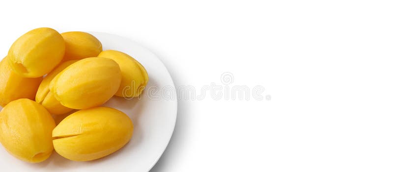 Marian plum or Plum mango fruit in the dish on white background with clipping path royalty free stock photography