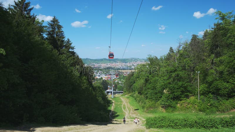 Red cable cars in summer, cableway on Pohorje mountain, near Maribor, Slovenia