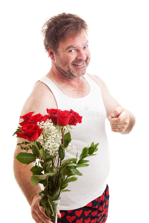 Marido con las flores de las tarjetas del día de San Valentín imagen de archivo libre de regalías Marido con las flores de las tarjetas del día de San Valentín imagen de archivo libre de regalías