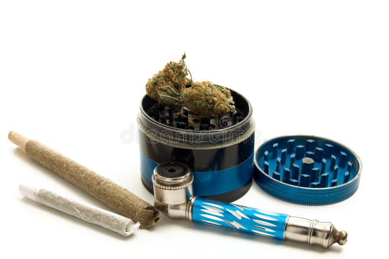Marijuana Joint, Pipe and Grinder on White Background Stock Photo