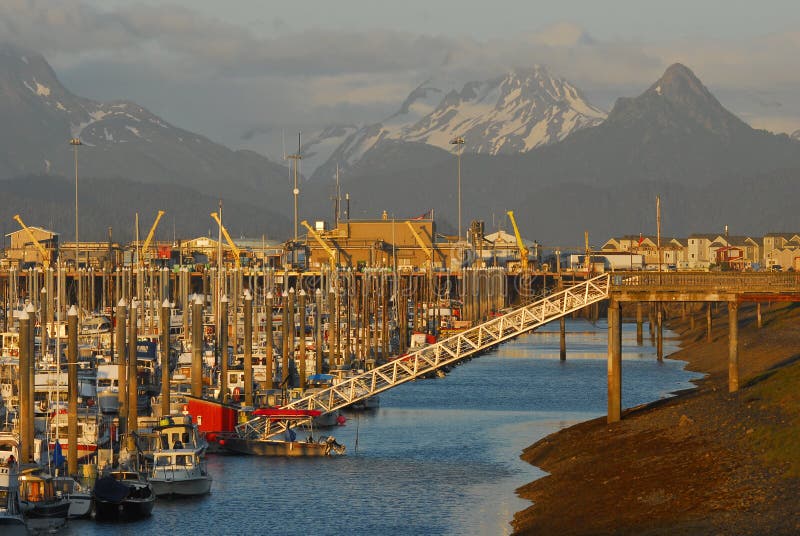 The small boat harbor on Kachemak Bay at the Homer Spit in South-Central Alaska. Commercial and recreational fishing abounds. Many consider Homer to be the Halibut fishing capital of the world. The small boat harbor on Kachemak Bay at the Homer Spit in South-Central Alaska. Commercial and recreational fishing abounds. Many consider Homer to be the Halibut fishing capital of the world.