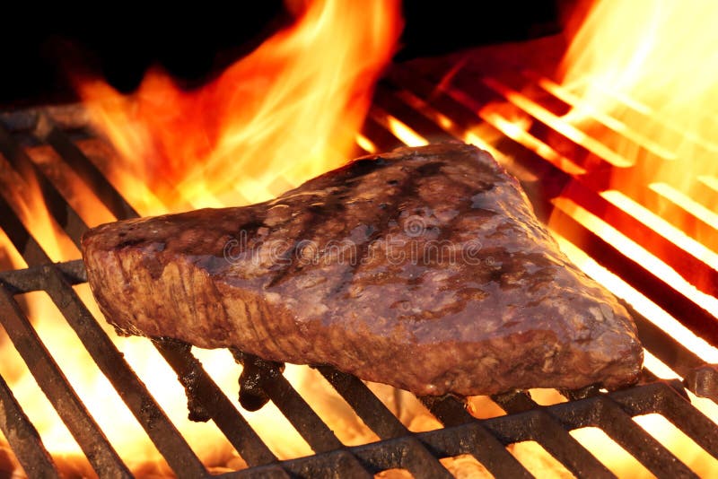 Marinated Beef Steak on the Flaming Hot BBQ Grill. Stock Image Image