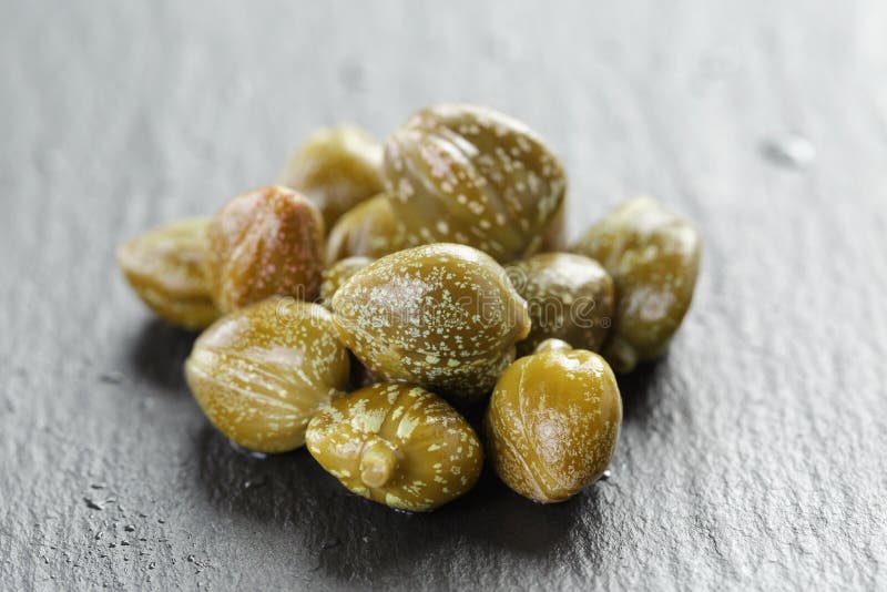 Marinated Capers in Olive Bowl on Slate Board Stock Image Image of