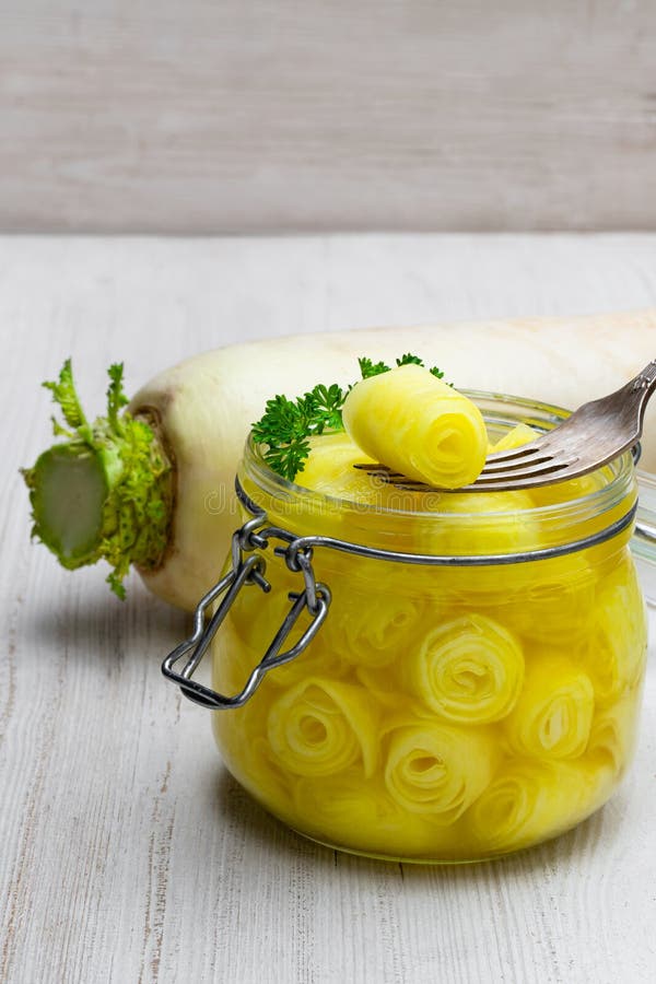 Marinated Daikon on White Background in the Glass Jar Stock Image