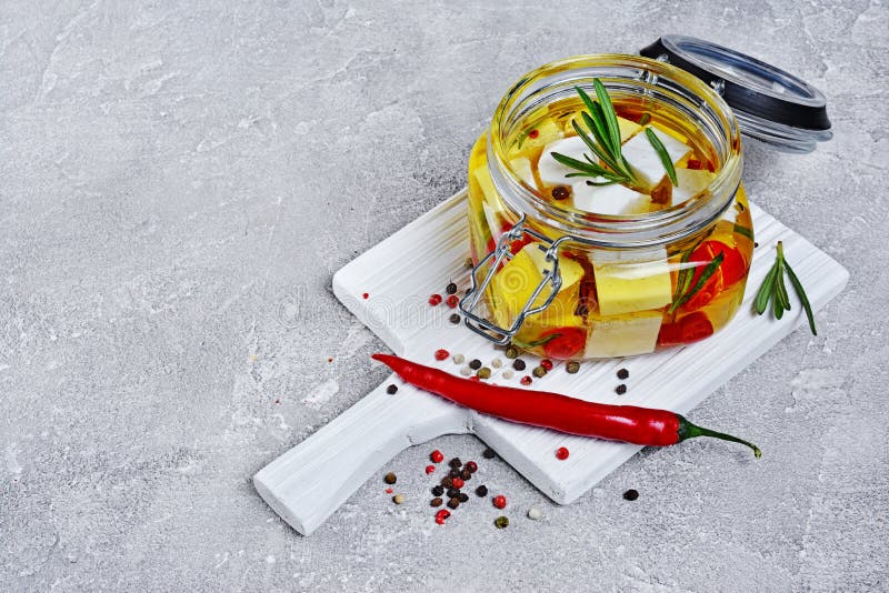 Marinated Feta Cheese With Olive Oil And Spice Of Red Chili Pepper And