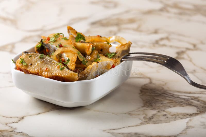 Marinated Herring Fish with Onion and Tomato Sauce in White Bowl Stock Image Image of food