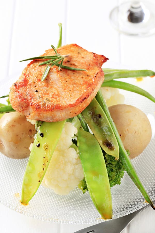 Marinated Pork Chop and Vegetables Stock Photo - Image of cauliflower