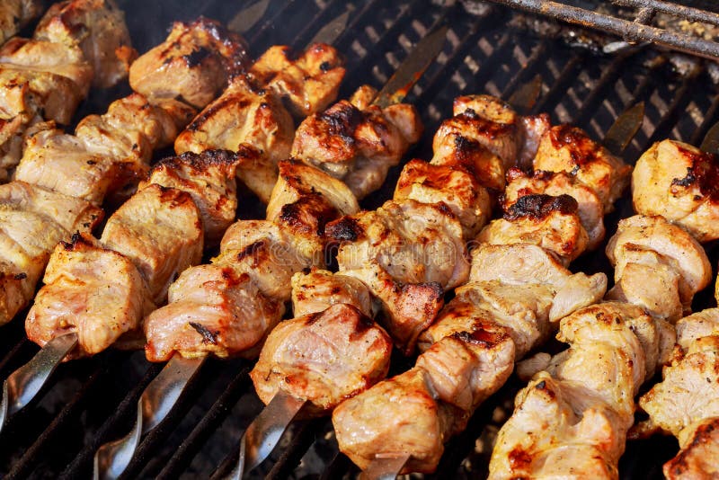 Marinated Shashlik Preparing on a Barbecue Grill Over Charcoal ...