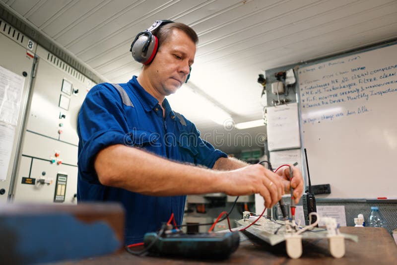 Marine Electrical Engineer Officer in Engine Control Room ECR. he Works