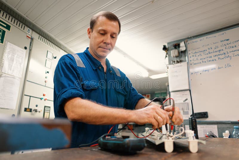 Marine Electrical Engineer Officer in Engine Control Room ECR. he Works