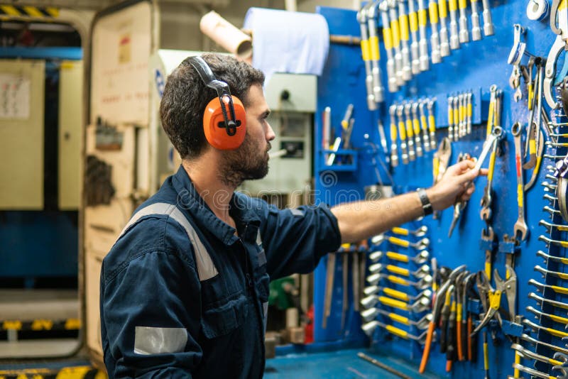 Marine Engineer Officer Working in Engine Room Stock Image Image of