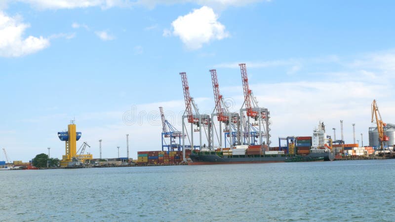 Marine port cranes, and industrial zone in cargo front of Odessa sea commercial port in Ukraine.