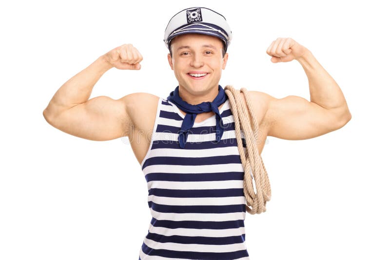 Marinero de sexo masculino fuerte que dobla su bíceps imagen de archivo libre de regalías Marinero de sexo masculino fuerte que dobla su bíceps imagen de archivo libre de regalías