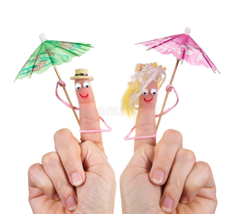 Caricature made of a finger puppet representing a happy couple. Caricature made of a finger puppet representing a happy couple