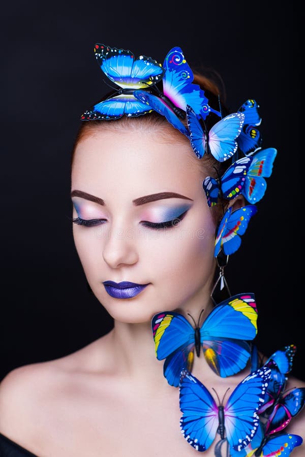  Mariposa Del Azul De La Mujer Imagen de archivo
