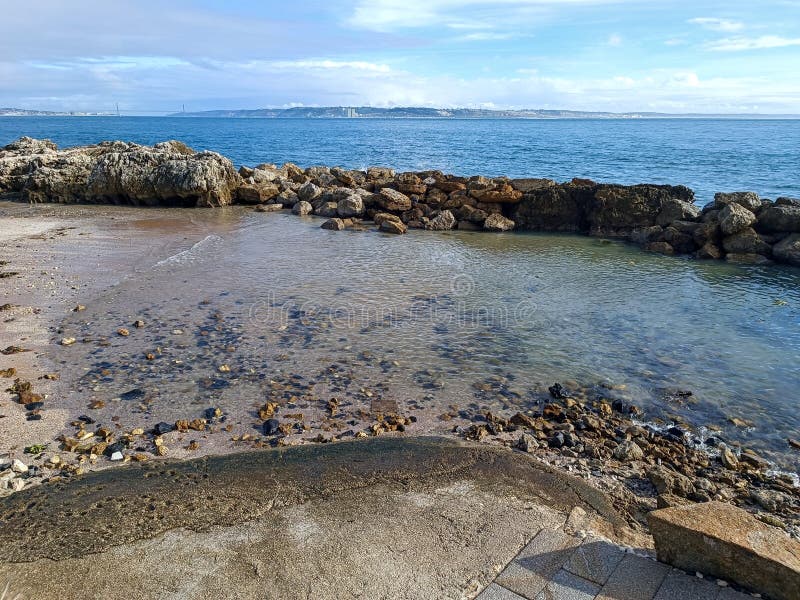 rocks on the beach with cloudy sky. rocks on the beach with cloudy sky