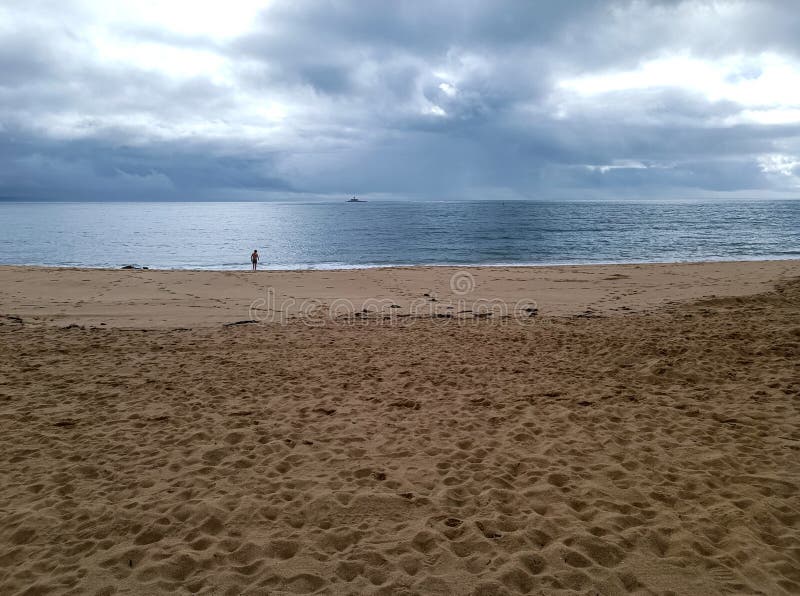 rocks on the beach with cloudy sky. rocks on the beach with cloudy sky