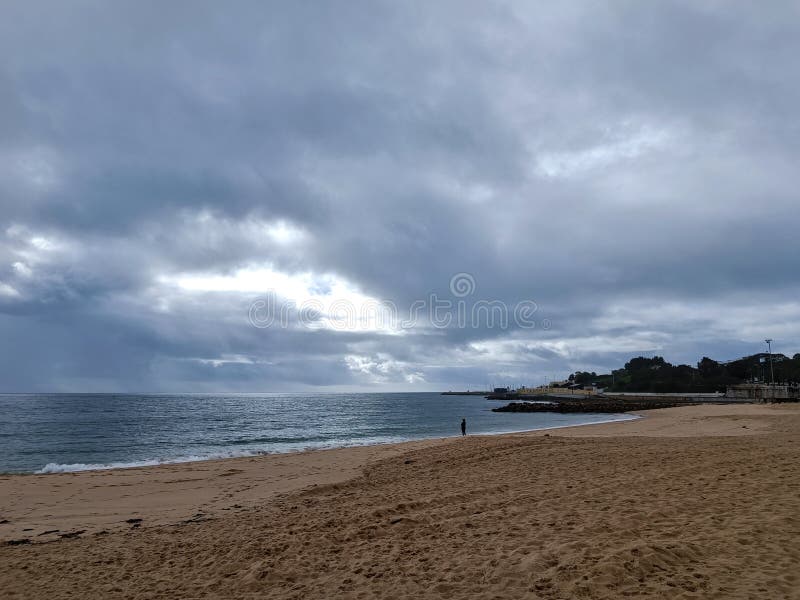 rocks on the beach with cloudy sky. rocks on the beach with cloudy sky