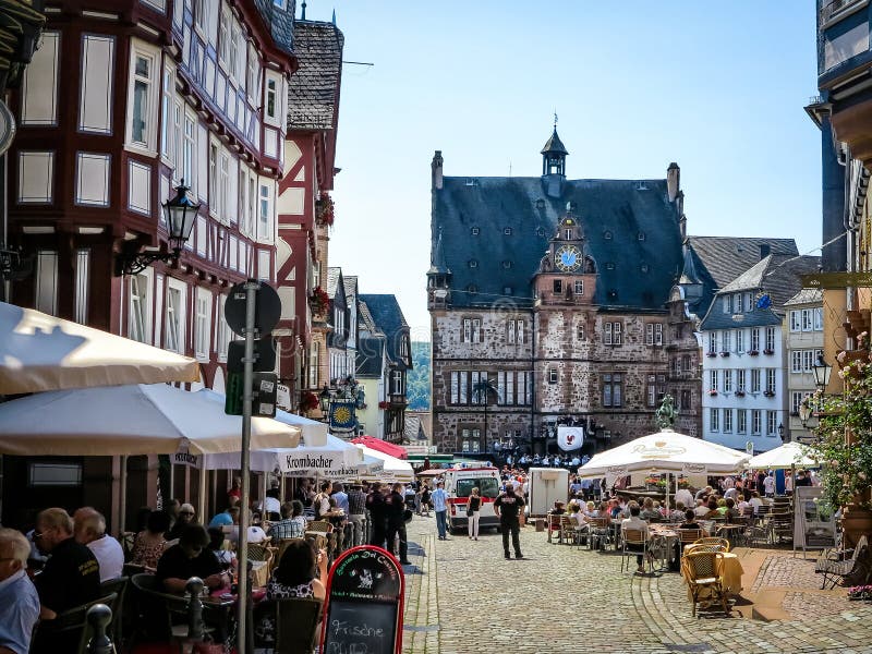 MARBURG, GERMANY-JULY 07, 2013: Market square with historical Town Hall in University City of Marburg, Germany