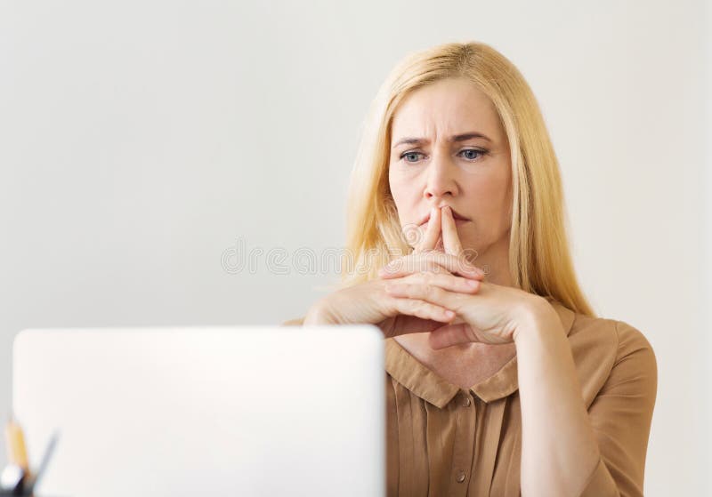 Marketer Thinking About New Ideas, Working On Laptop stock photos Marketer Thinking About New Ideas, Working On Laptop stock photos