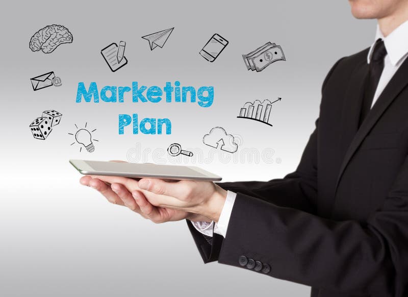 Marketing Plan concept, young man holding a tablet computer stock images Marketing Plan concept, young man holding a tablet computer stock images