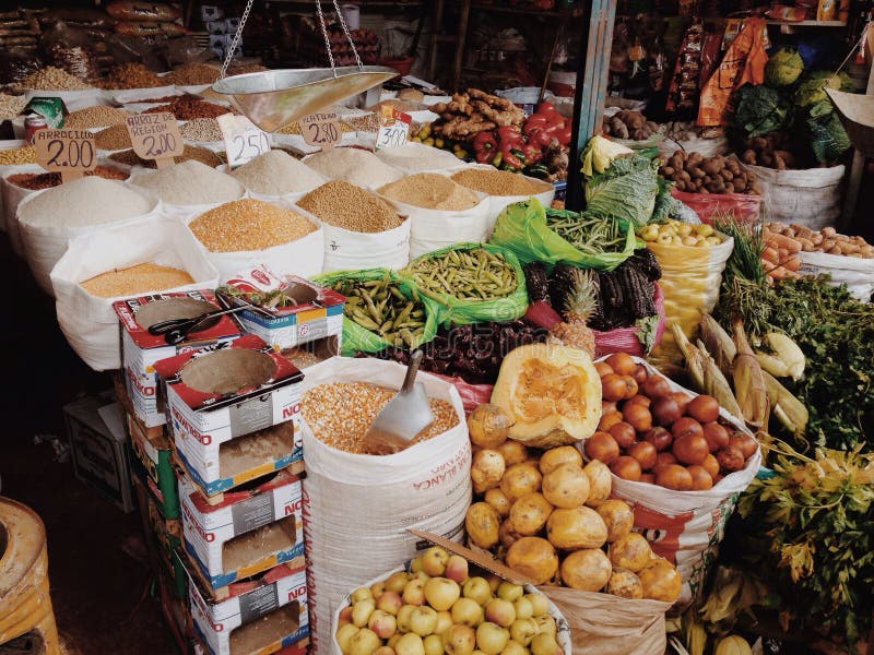 Exotic marketplace selling fruits, vegetables and seeds in South America, Peru.