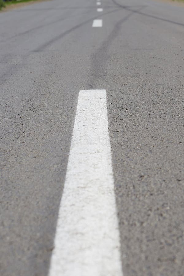 Marking on the Road Going into the Distance, Asphalt Road Stock Photo