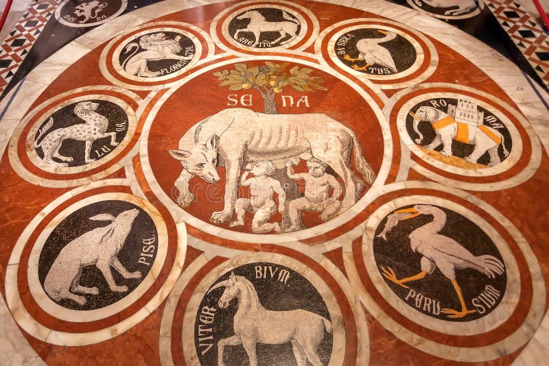 Marmeren mozaïek met de symbolen van Rome en Siena op vloer van Di Siena van de 14de eeuwduomo stock foto Marmeren mozaïek met de symbolen van Rome en Siena op vloer van Di Siena van de 14de eeuwduomo stock foto