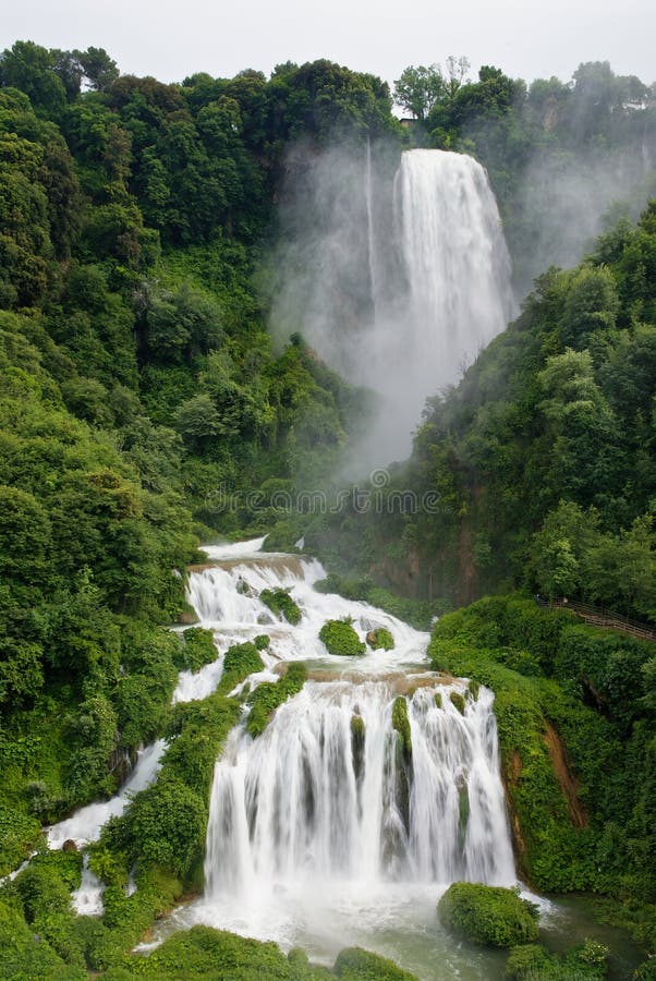 The Cascata delle Marmore (Marmore's Falls) is a man-made waterfall created by the ancient Romans. Its total height is 165 m, making it one of the tallest in Europe and the tallest man-made waterfall in the world. Terni, Umbria. Man made waterfall stock images, royalty-free photos and pictures