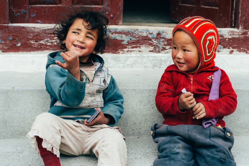 Marpha - 27th of April, 2015 - two unidentified children in village Marpha, Nepal stock image Marpha - 27th of April, 2015 - two unidentified children in village Marpha, Nepal stock image