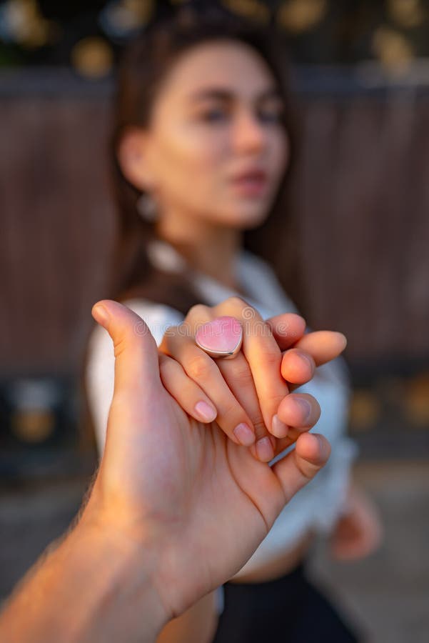 Marriage Proposal. Holding a Girl`s Hand with a Ring Stock Photo