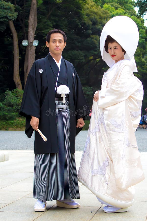 Married couple with traditional costumes before a Japan wedding