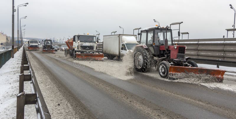 March 2, 2018, Ukraine Kiev, cars work are cleaned of snow Southern Bridge. March 2, 2018, Ukraine Kiev, cars work are cleaned of snow Southern Bridge