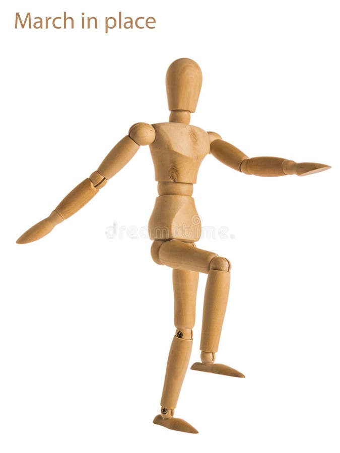 Demonstration of wood manikin in march in place exercise pose on white background. Demonstration of wood manikin in march in place exercise pose on white background.