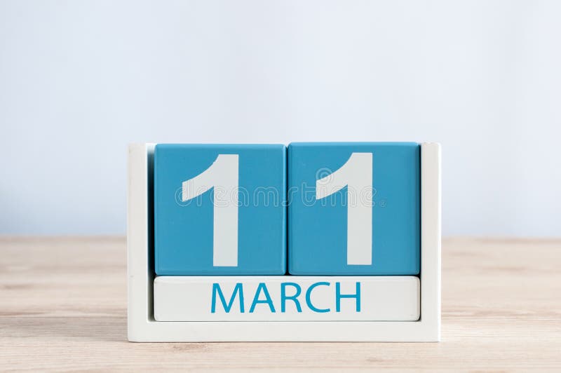 March 11th. Image of march 11 wooden color calendar on white background. Spring day, empty space for text. March 11th. Image of march 11 wooden color calendar on white background. Spring day, empty space for text.