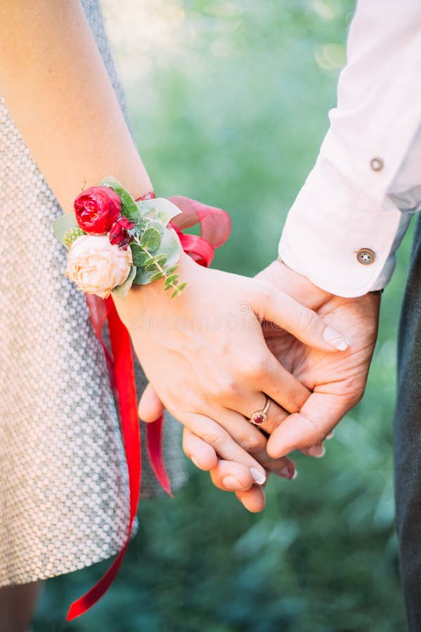 Marsala Wedding Inspiration. Bride and Groom Holding Hands on Green  Background, Close Up. Marriage Concept Stock Image - Image of flower,  ceremony: 181901859
