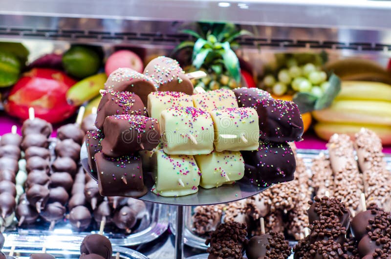 Marshmallow Covered in Chocolate for Sale at the Fair Stock Image