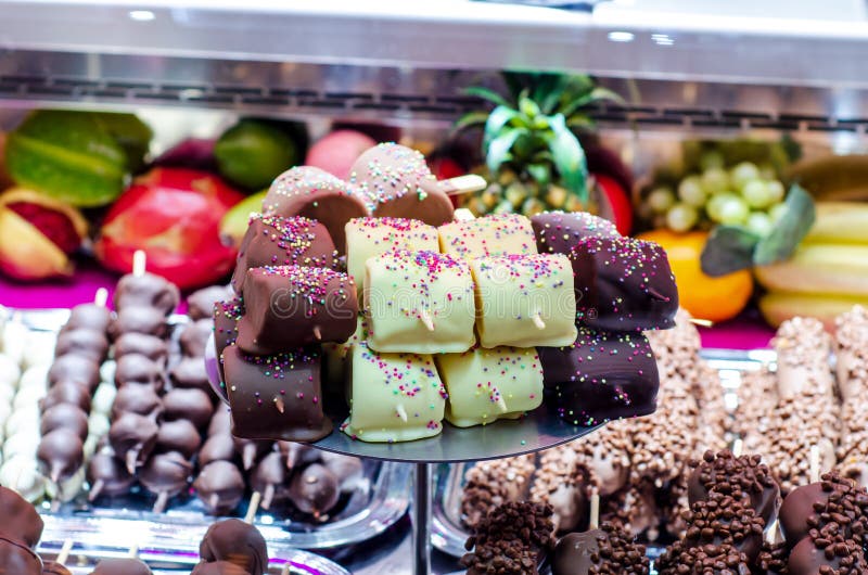 Marshmallow Covered in Chocolate for Sale at the Fair Stock Image