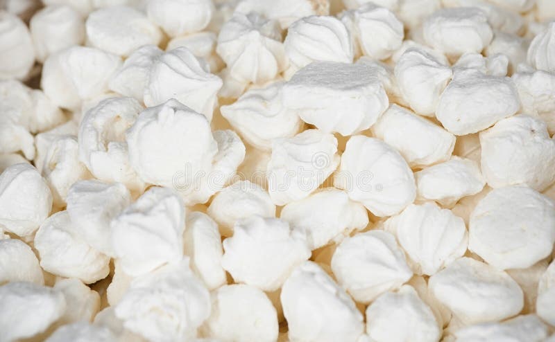 Marshmallows. Background or texture of white mini marshmallows stock images