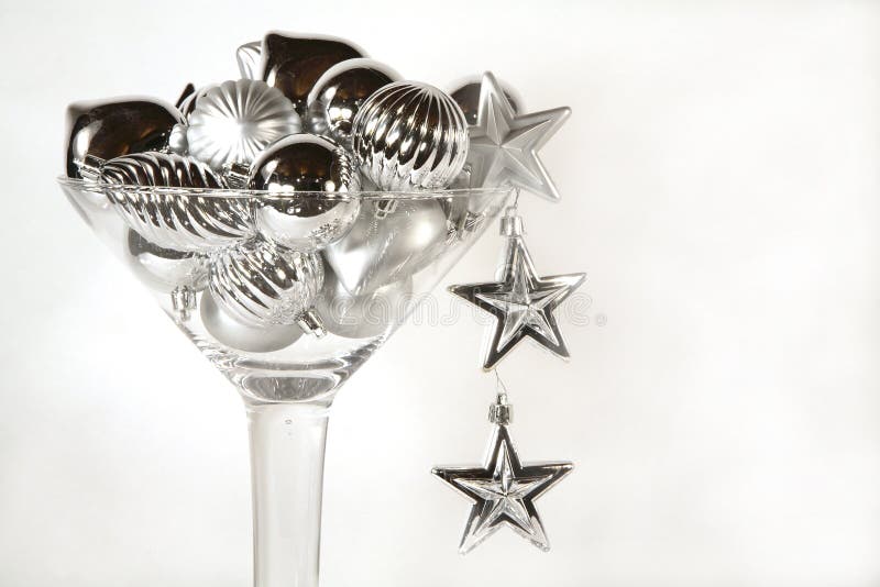 Martini glass of silver christmas ornaments