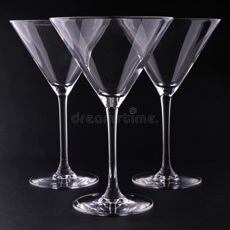 Martini glasses on black stock photo. Image of crystal 19510210