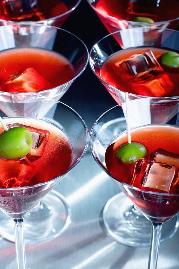 Martini Glasses With Olive And Ice Cube Picture. Image 6902601