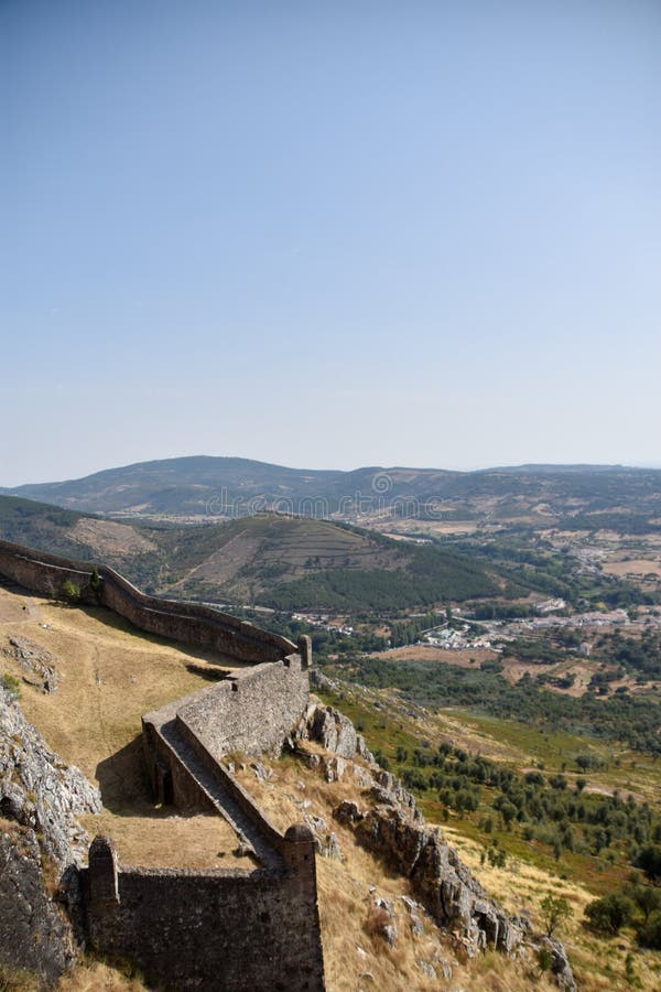 MarvÃ£o  is a municipality in Portalegre District in Portugal. The population in 2020 was 2,972 and dropping at a rate of around one inhabitant per week, in an area of 154.90 km2. The present Mayor is LuÃ­s Vitorino, elected by the Social Democratic Party. The municipal holiday is September 8.

Perched on a quartzite crag of the Serra de SÃ£o Mamede, MarvÃ£o`s name is derived from an 8th-century Muwallad rebel, named Ibn Marwan. Ibn Marwan, who constructed the Castle of MarvÃ£o - likely on the site of an earlier Roman watchtower - as a power base when establishing an independent statelet `emirate`, duchy - covering much of modern-day Portugal - during the Emirate of Cordoba 884-931 CE. The castle and walled village were further fortified through the centuries, notably under Sancho II of Portugal 13th century and Denis of Portugal.

The village has generated significant tourist interest in recent years. It was included in the #1 New York Times bestselling book, 1000 Places to see Before you Die.[3] Nobel Prize-winning author JosÃ© Saramago wrote of the village, `From MarvÃ£o one can see the entire land ... It is understandable that from this place, high up in the keep at MarvÃ£o Castle, visitors may respectfully murmur, `How great is the world`.`. MarvÃ£o  is a municipality in Portalegre District in Portugal. The population in 2020 was 2,972 and dropping at a rate of around one inhabitant per week, in an area of 154.90 km2. The present Mayor is LuÃ­s Vitorino, elected by the Social Democratic Party. The municipal holiday is September 8.

Perched on a quartzite crag of the Serra de SÃ£o Mamede, MarvÃ£o`s name is derived from an 8th-century Muwallad rebel, named Ibn Marwan. Ibn Marwan, who constructed the Castle of MarvÃ£o - likely on the site of an earlier Roman watchtower - as a power base when establishing an independent statelet `emirate`, duchy - covering much of modern-day Portugal - during the Emirate of Cordoba 884-931 CE. The castle and walled village were further fortified through the centuries, notably under Sancho II of Portugal 13th century and Denis of Portugal.

The village has generated significant tourist interest in recent years. It was included in the #1 New York Times bestselling book, 1000 Places to see Before you Die.[3] Nobel Prize-winning author JosÃ© Saramago wrote of the village, `From MarvÃ£o one can see the entire land ... It is understandable that from this place, high up in the keep at MarvÃ£o Castle, visitors may respectfully murmur, `How great is the world`.`