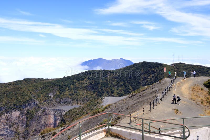 March 3 2023 - Irazu Volcano in Costa Rica: People enjoy the Irazu Volcano National Park in the background the Turrialba Volcano. March 3 2023 - Irazu Volcano in Costa Rica: People enjoy the Irazu Volcano National Park in the background the Turrialba Volcano