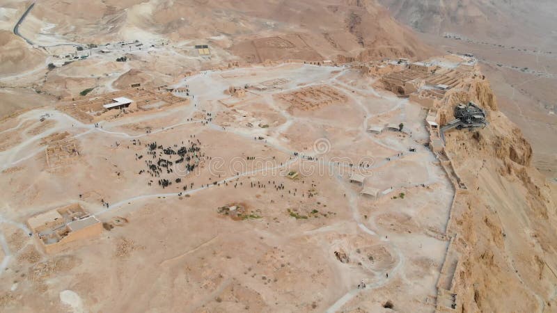 Masada - Aerial footage of the ancient fortification in the Southern District of Israel. Israeli soldiers on top of the