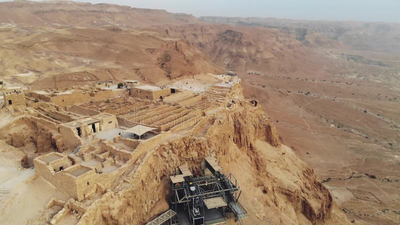 Masada - Aerial footage of the ancient fortification in the Southern District of Israel. Moving forward. Flying around