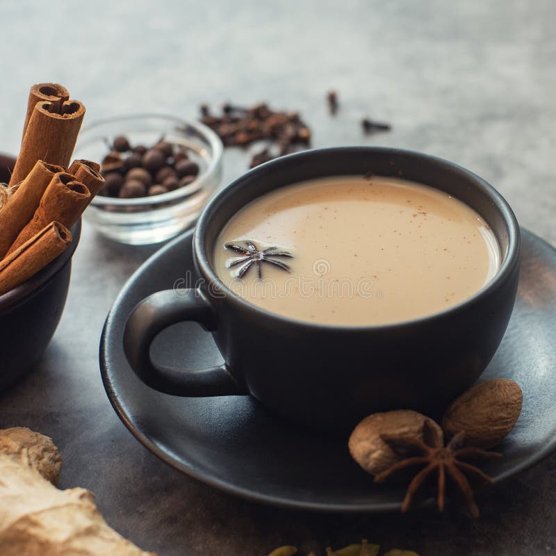 Cup of Traditional Indian Masala Chai Tea with Ingredients: Cinnamon ...
